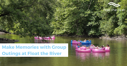 a group of people on a boat in the water