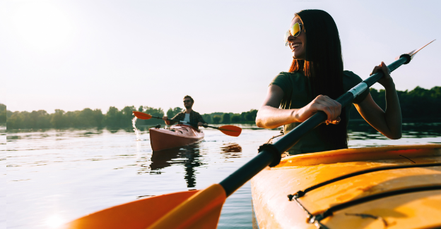 a man rowing a boat in the water